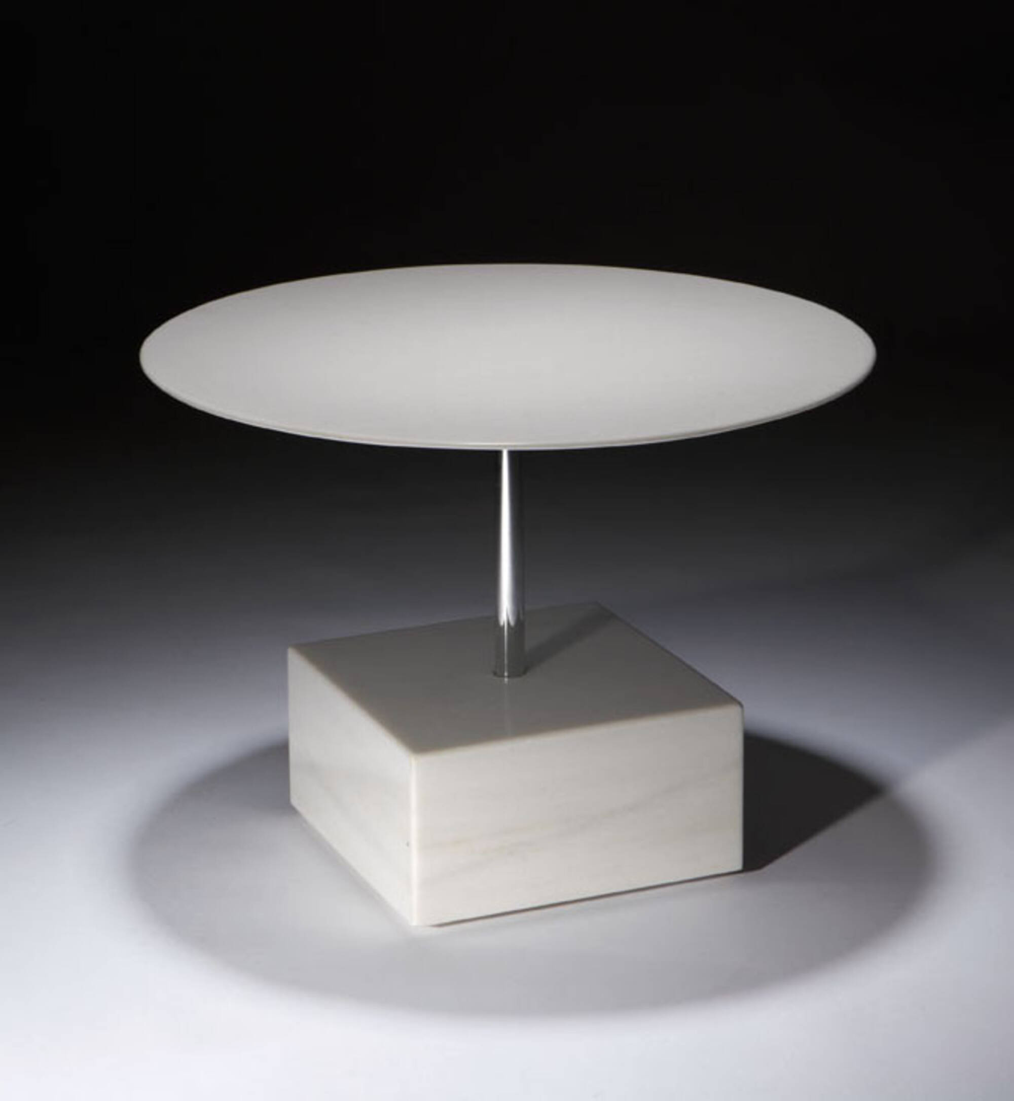 Circular coffee table with square base