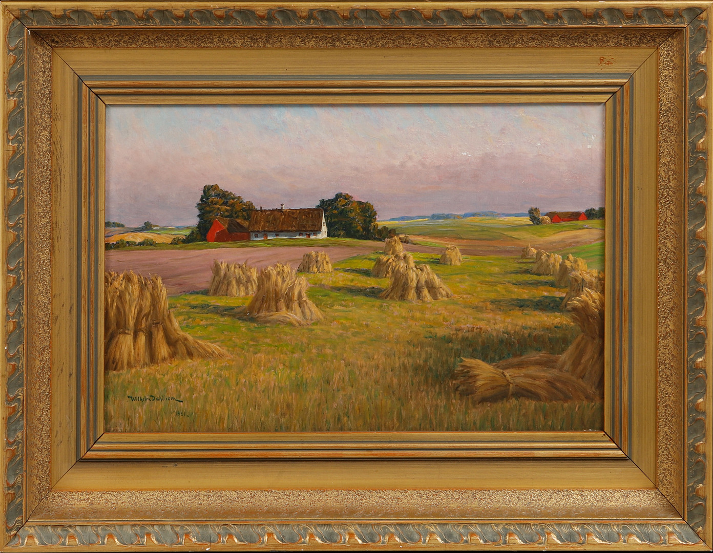 Landskap med gård och hässjor, olja på duk, signerad och daterad 1921.