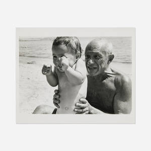 Pablo Picasso and his son Claude at the beach, Golfe-Juan, France