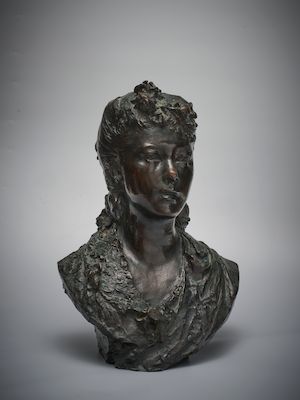 Auguste Rodin (French, 1840-1917) Buste de jeune fille aux fleurs dans les cheveux 47.0cm (18 1/2in.) high (Conceived circa 1868, this bronze version cast by the de Coubertin foundry in 1979 in an edition of 11.)