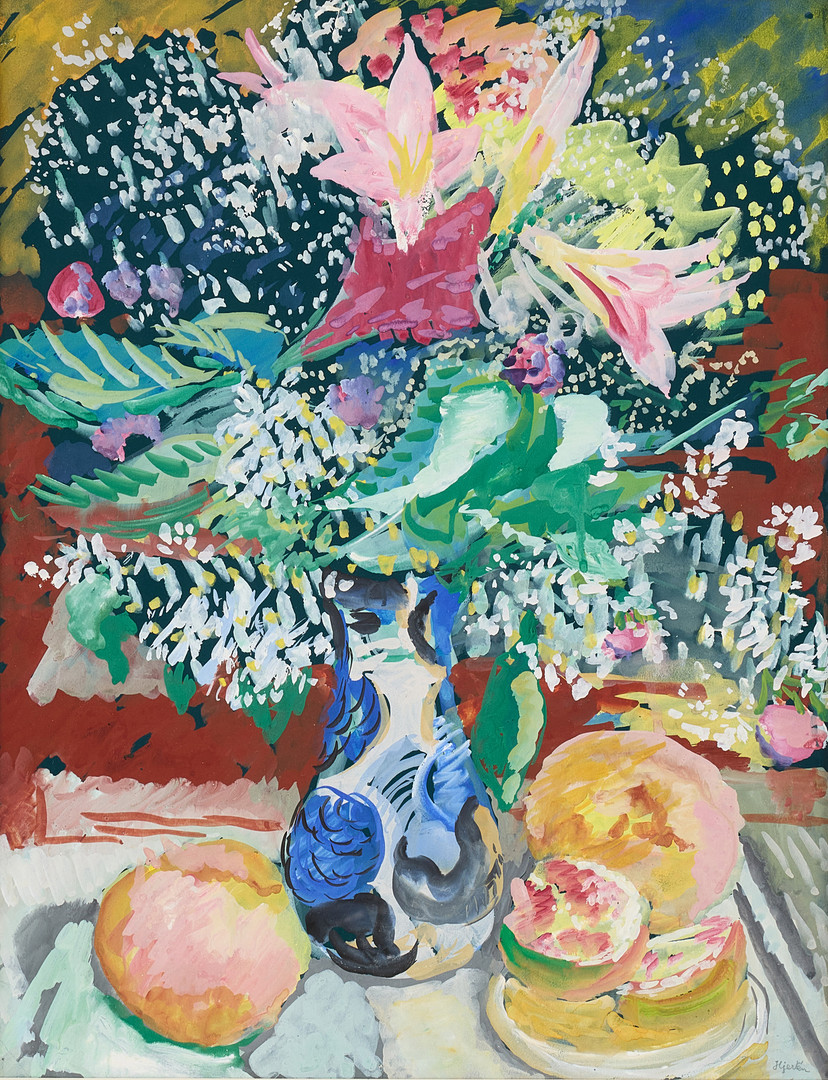 Still life with flowers in a blue jug.