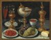 attributed to: A lavish still life with fruits on plates, gilt goblet, nautilus cup and a glass of wine. Unsigned. Oil on panel