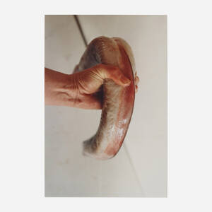 Girl Grasping Eel