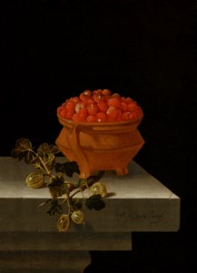 A bowl of wild strawberries with gooseberries on a stone ledge