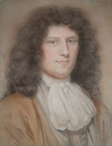 Portrait d'un jeune homme portant un costume beige et une chemise à jabot