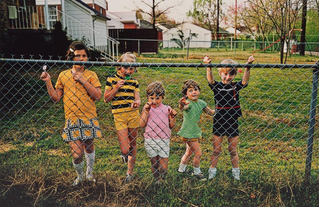 Untitled (children at a fence), circa 1970-1974