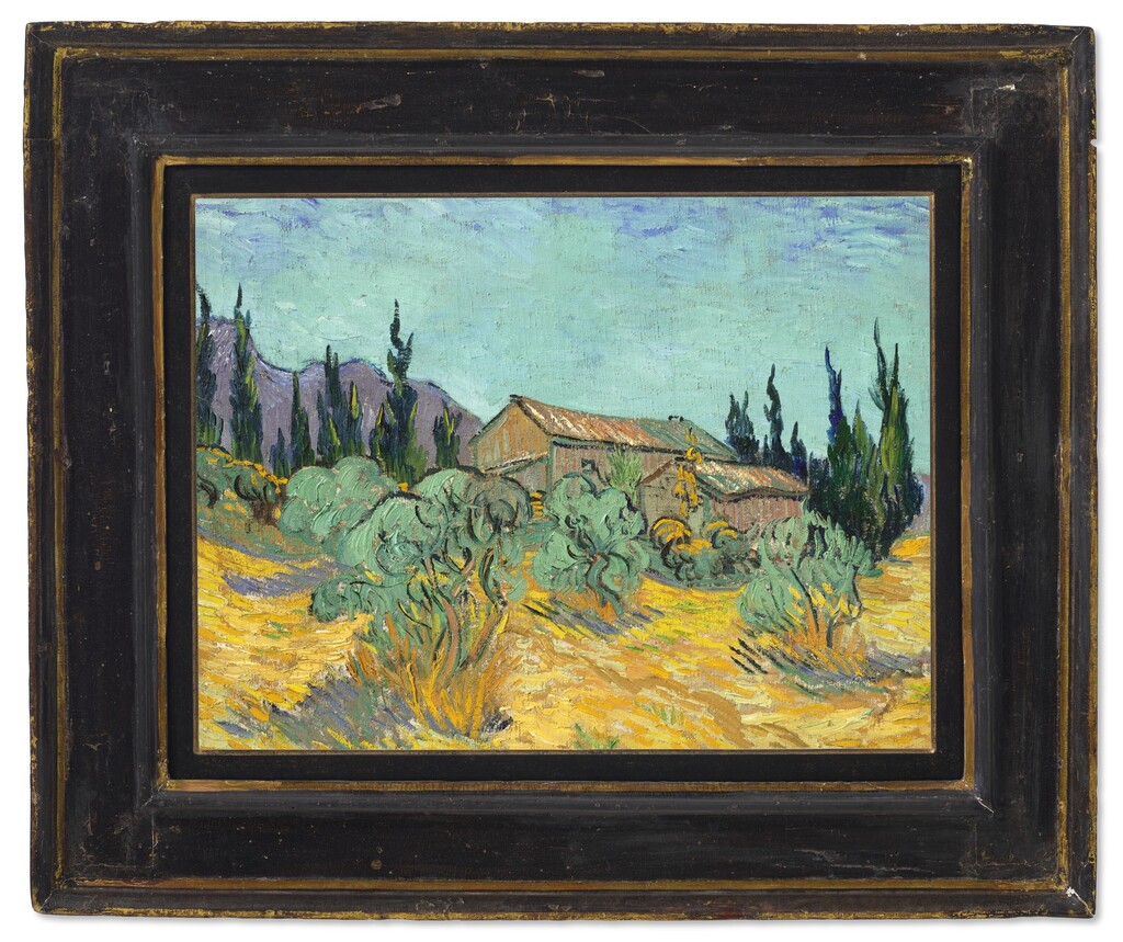 Cabanes de bois parmi les oliviers et cyprès