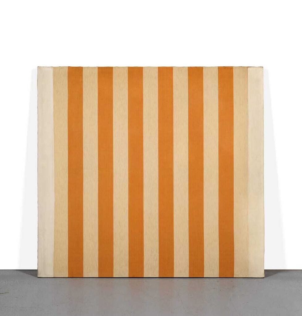White acrylic paint on white and orange striped fabric