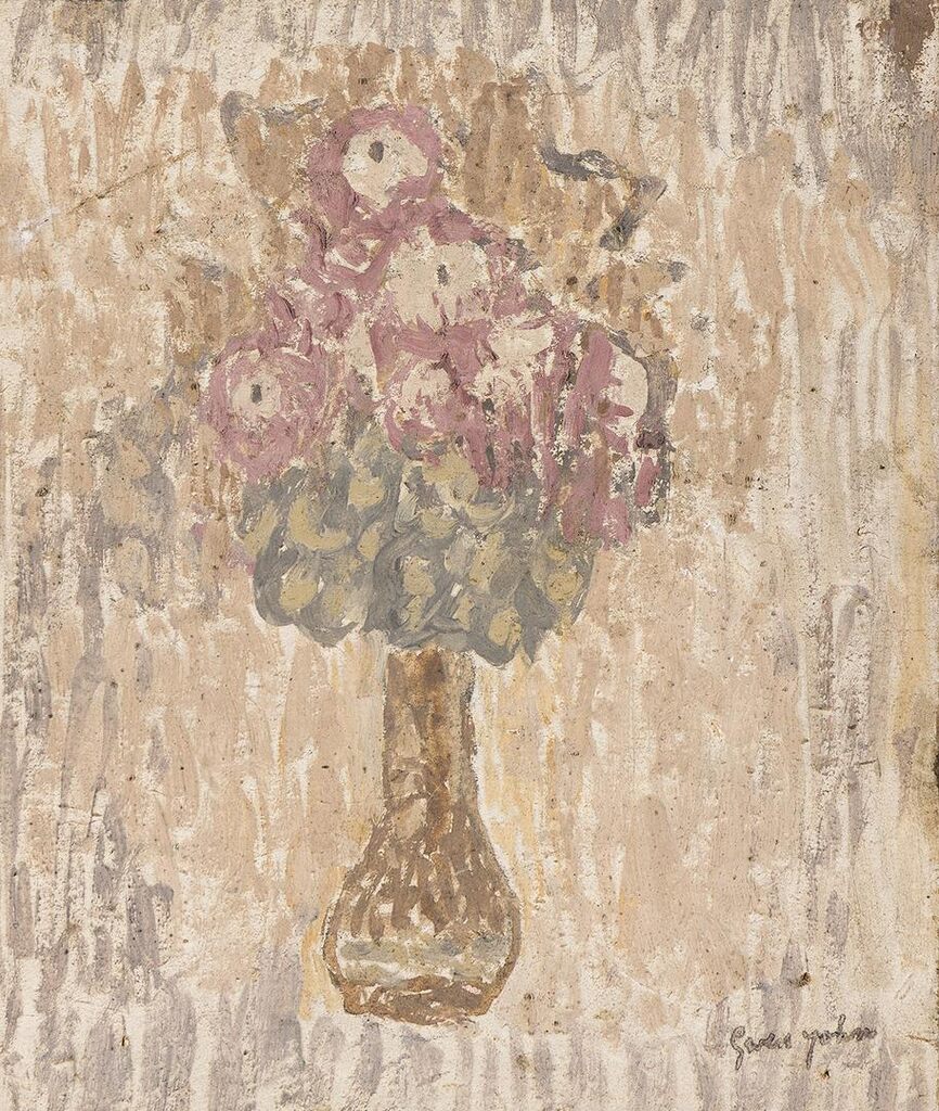A Vase of Mauve Colored Flowers