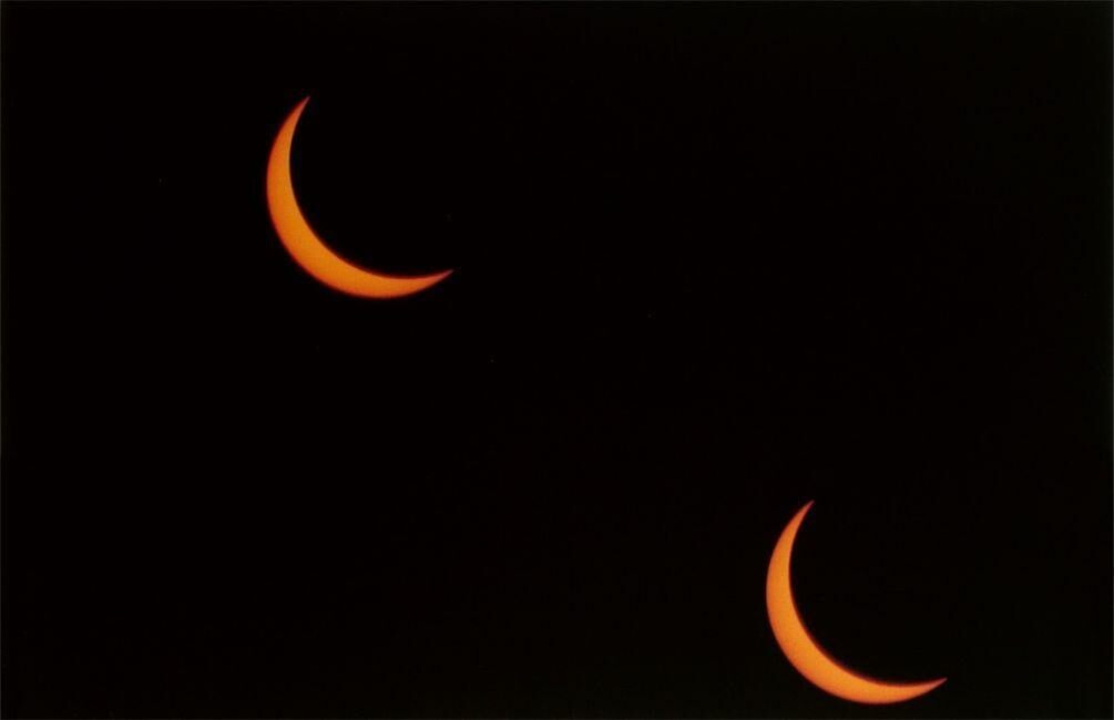 ”One Negative, Two Suns, Two Moons”