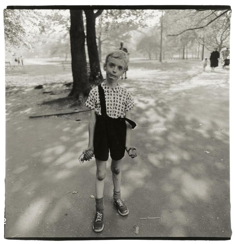 Child with a toy hand grenade in Central Park, N.Y.C.
