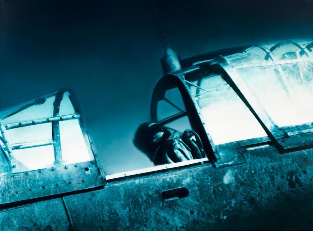 Untitled (Soldier sitting in cockpit)