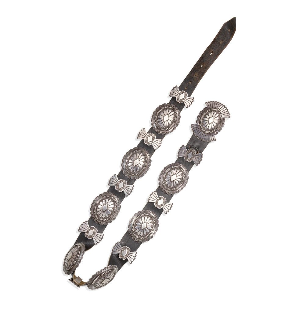 A silver concha belt, possibly by Woody Crumbo