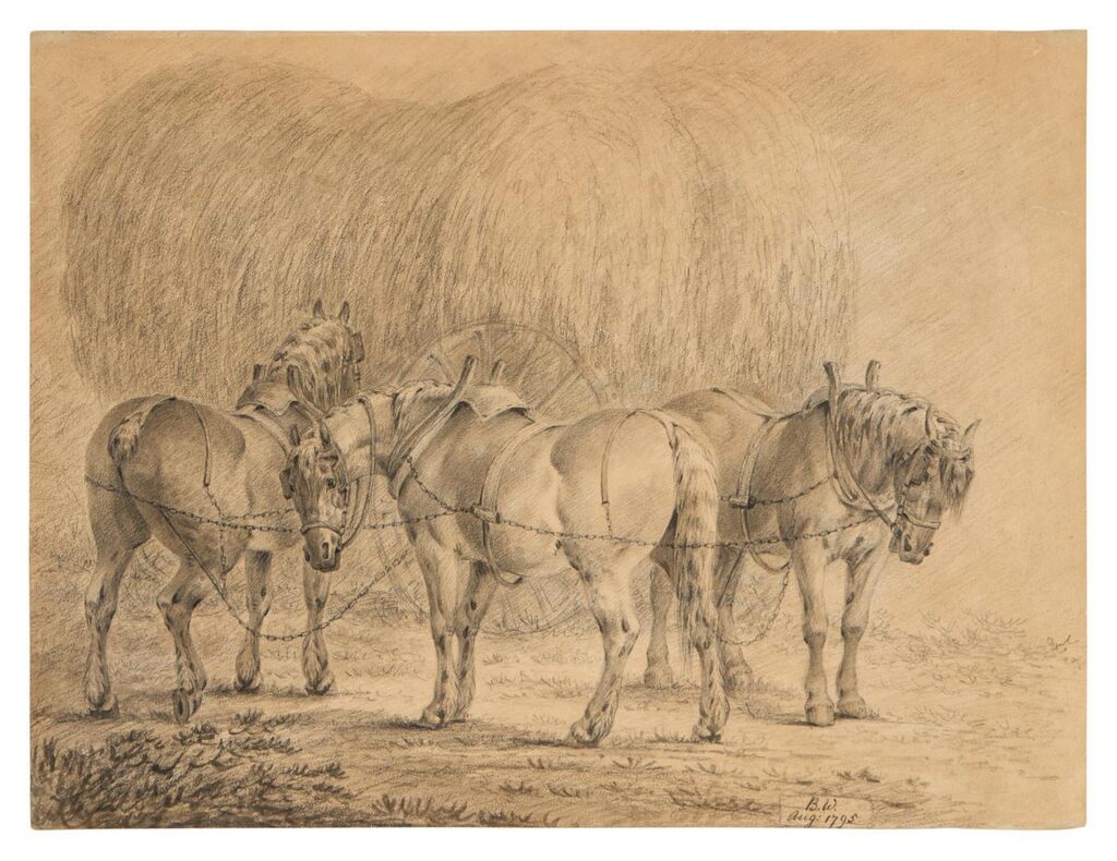 Carthorses with a cart laden with hay