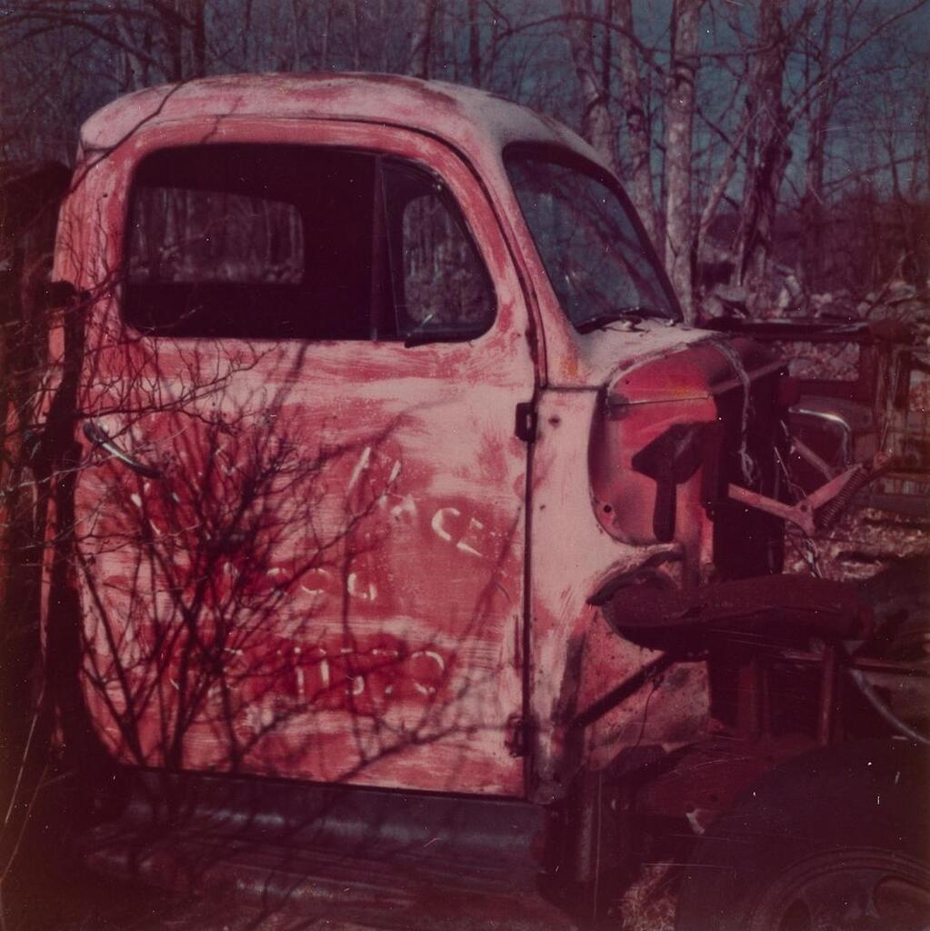 Pair of photographs of abandoned trucks auto graveyard Old Lyme Connecticut