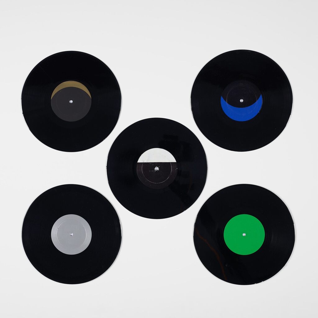A Suite of Five 10-inch Records with Colored Labels in Place of Titles