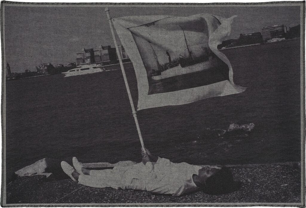 Holding flag laying at the edge of Pier 54 and the Hudson River