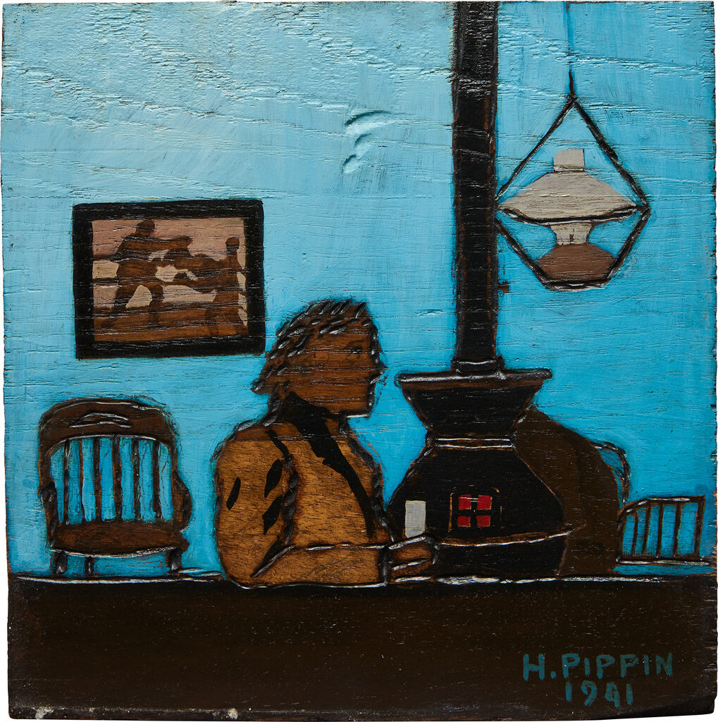 Man Seated Near Stove