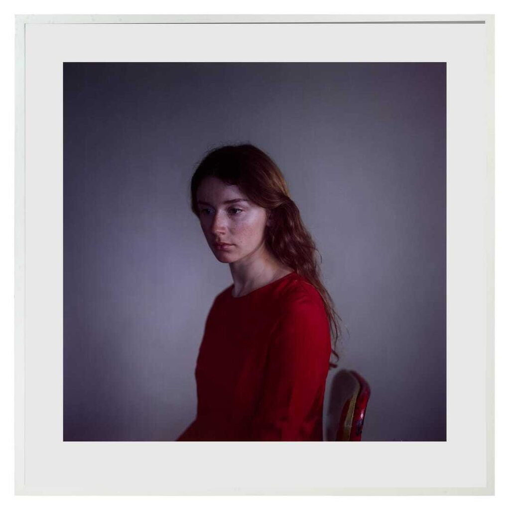 Tatiana in Red with New Red Chair, 2011