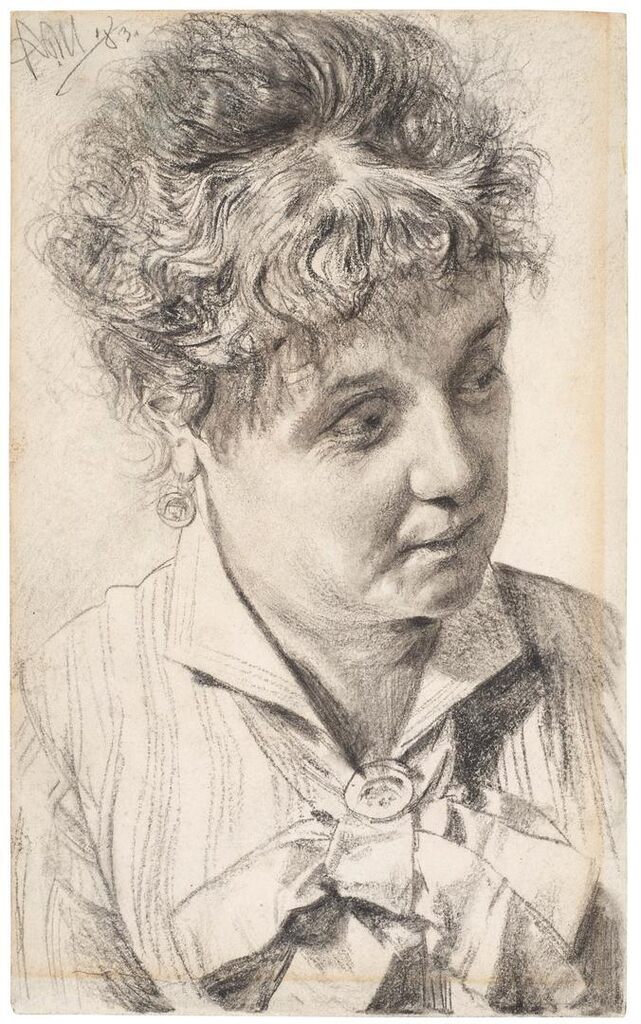 Portrait of a woman looking down to the right