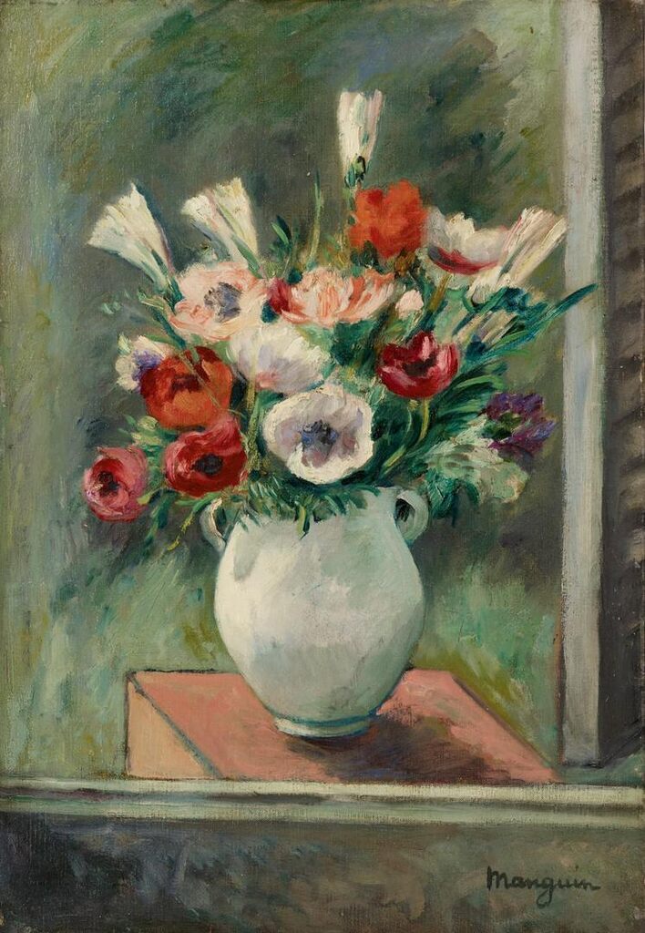Anémones dans un vase blanc