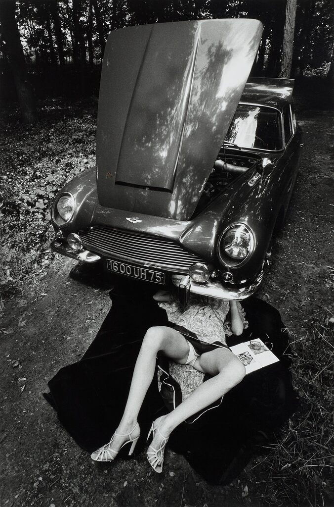 Alone Under a Car with Open Hood, Paris