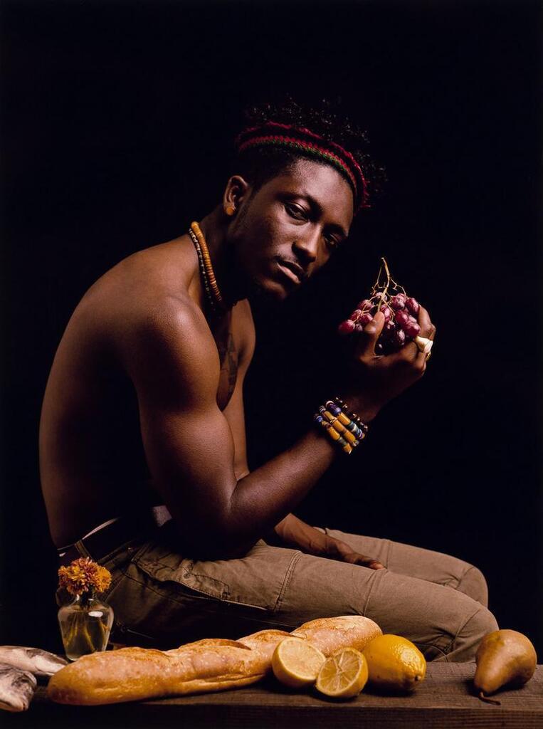 Boy Holding Grapes
