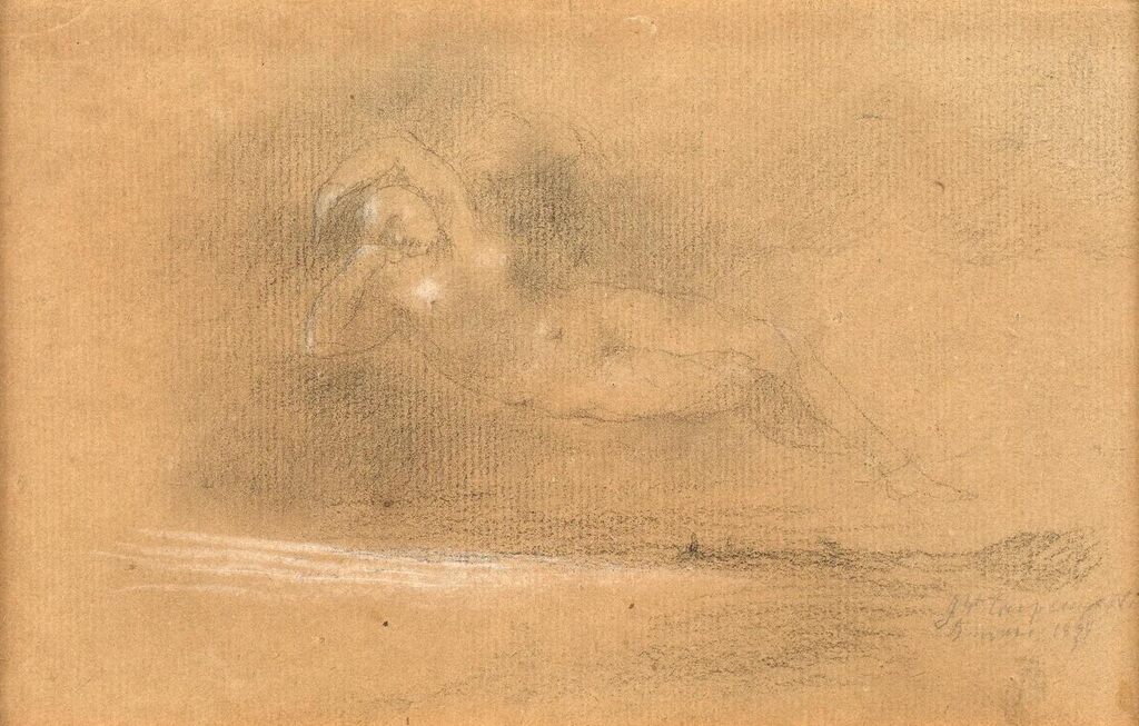 Young woman lying in a landscape