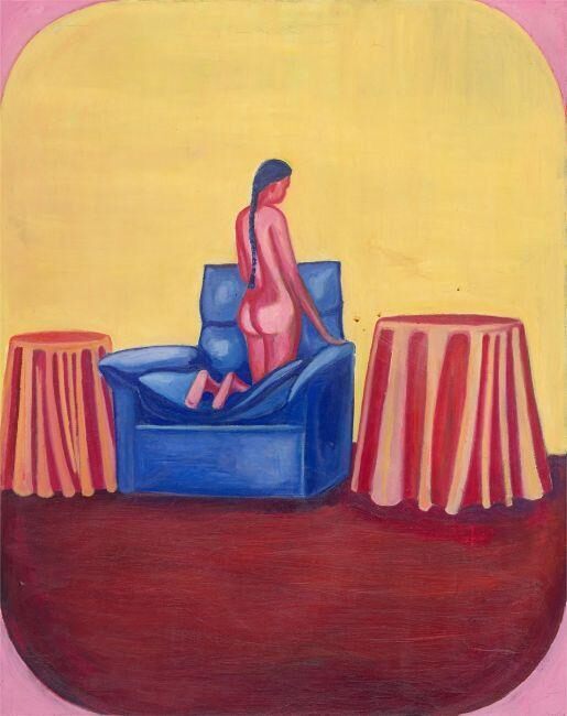 Nude on a blue armchair