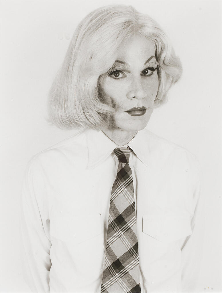 Andy Warhol in a blond wig Framed and glazed