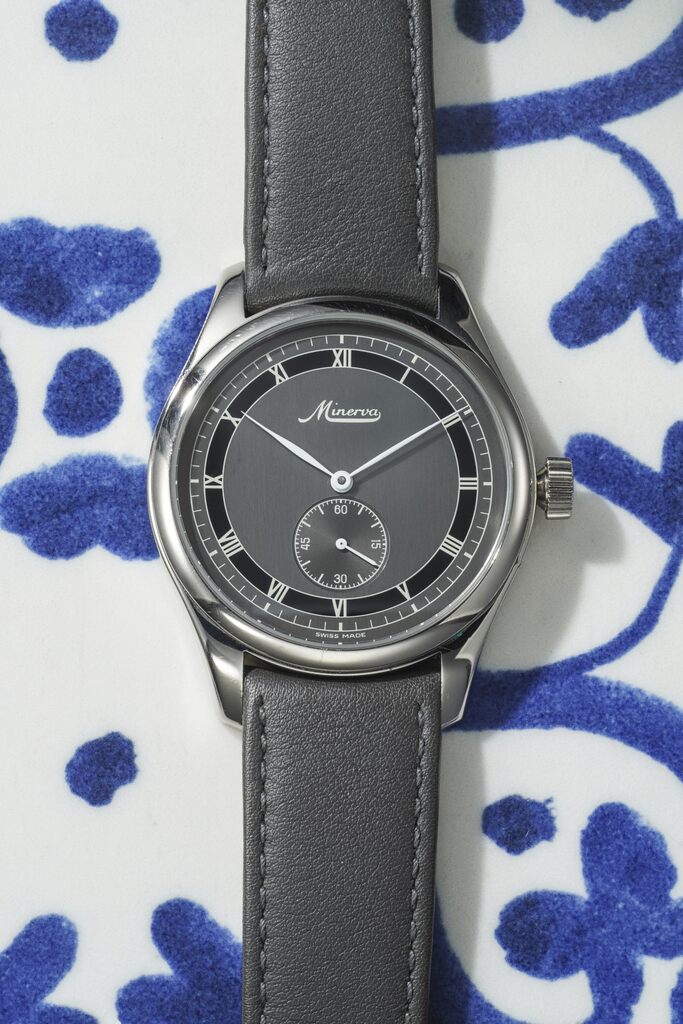 An elegant white gold wristwatch with sector dial and caliber 48 movement