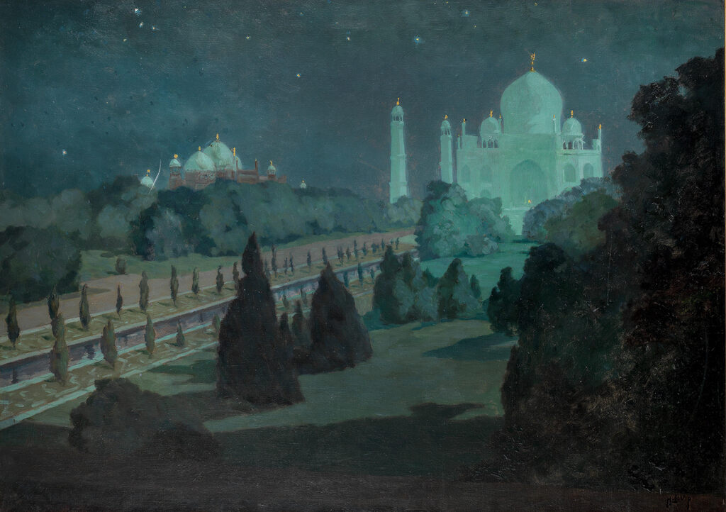 The Taj Mahal by moonlight, with the mosque beyond