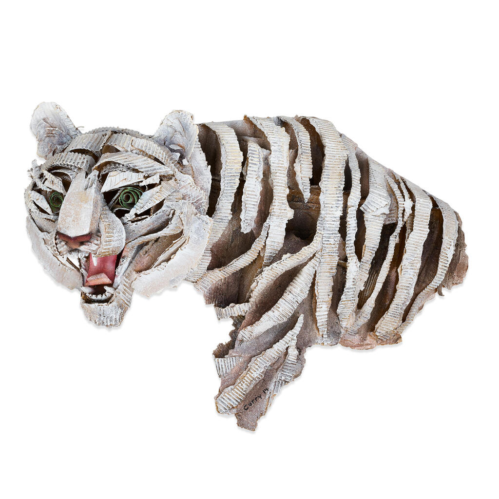 A PAINTED CARDBOARD WALL MOUNT FIGURE OF A WHITE TIGER