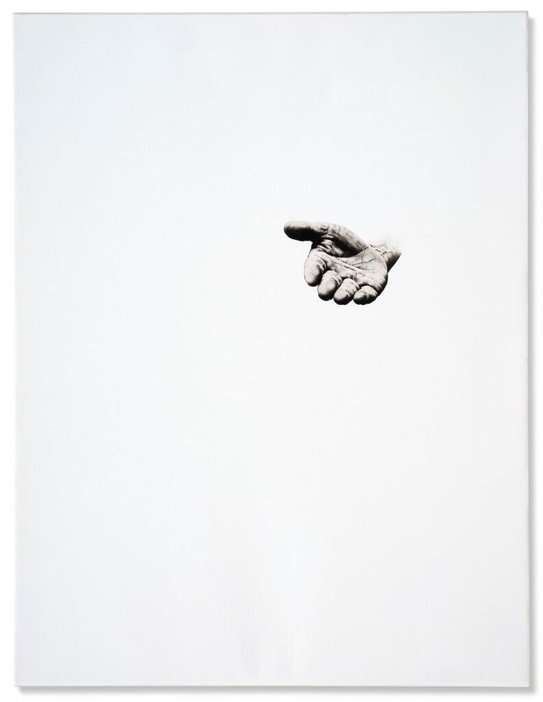 Il paesaggio con mano che lo indica