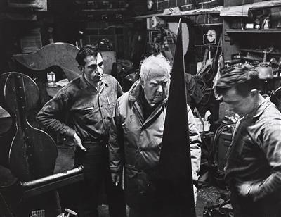 Alexander Calder. Waterbury Foundry inspecting work on a new "stabile"