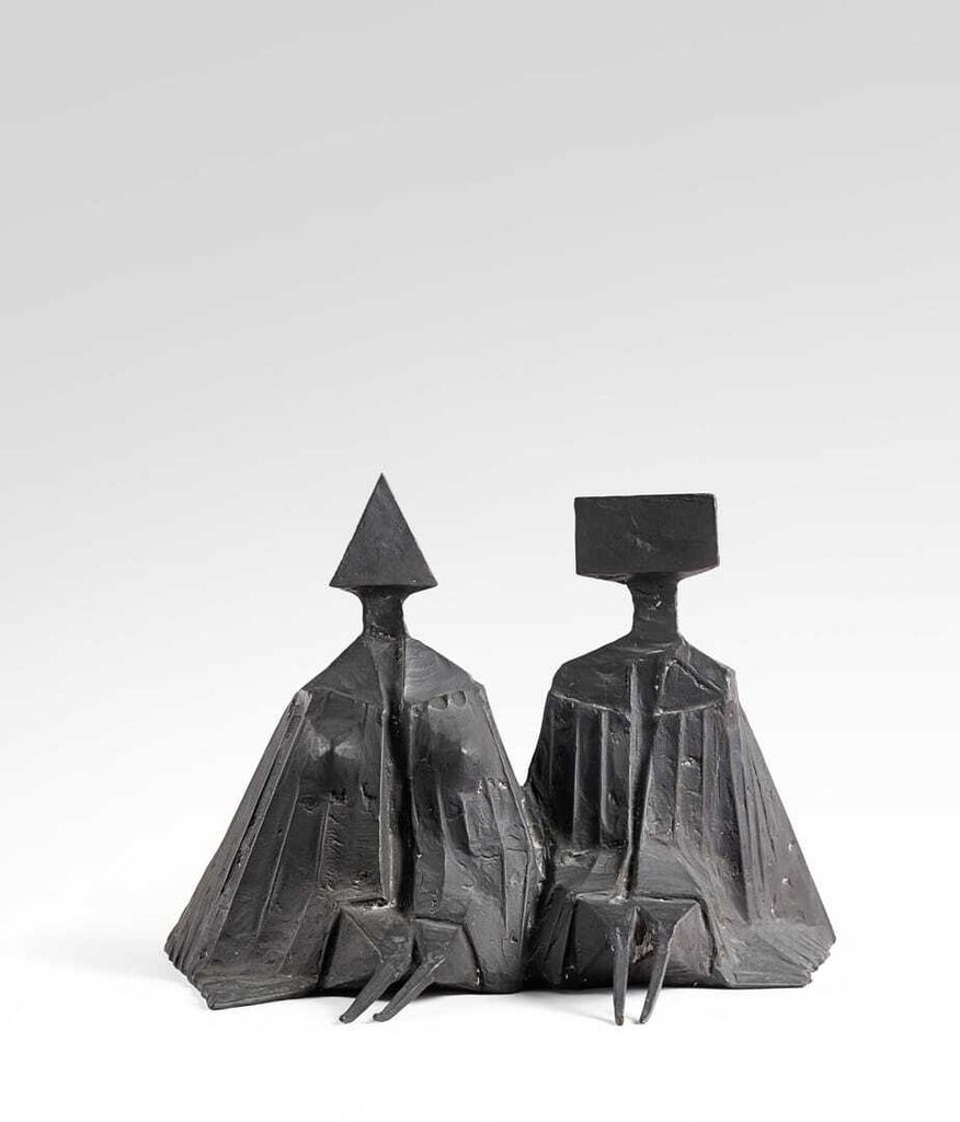 Pair of Sitting Figures