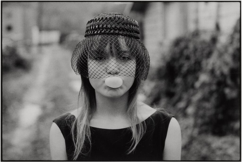 Tiny Blowing a Bubble, Seattle (from Streetwise)