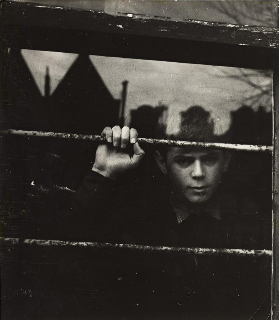 Tom looking out of train window