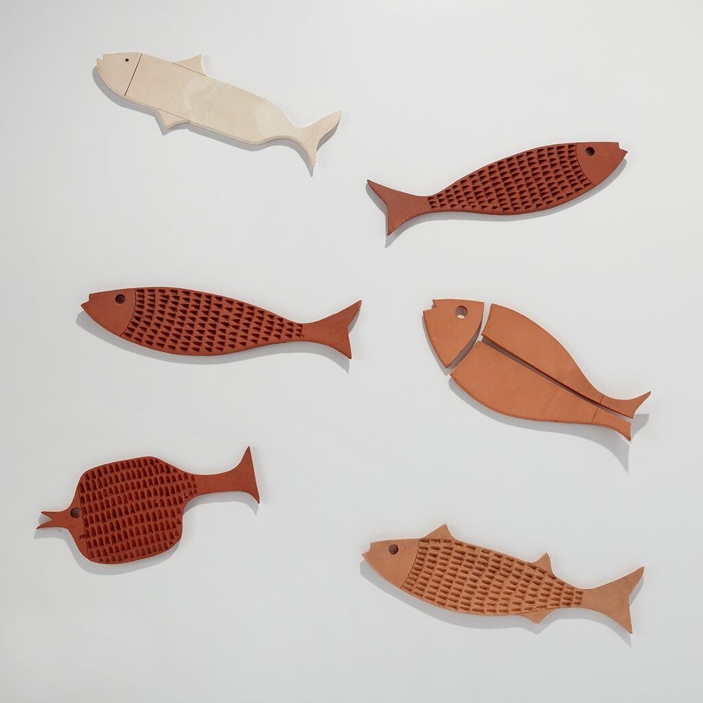 Six fish plaques
