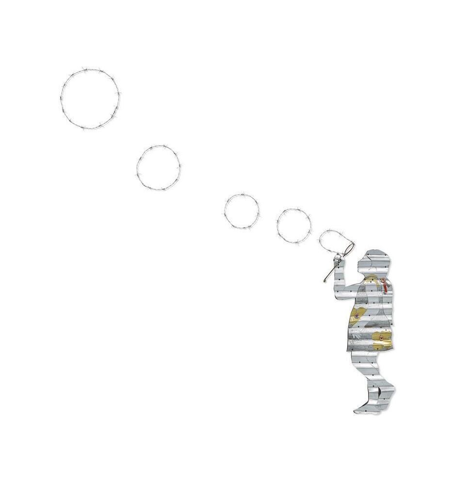 Little girl blowing soap bubbles