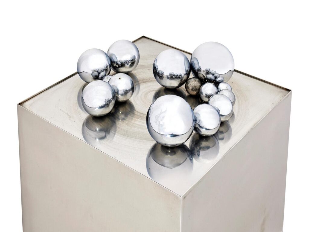 15 billes d'acier sur un cube