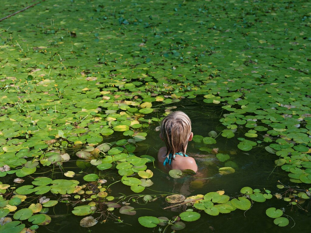 Maddie with Water Lilies, North Carolina from Human Nature
