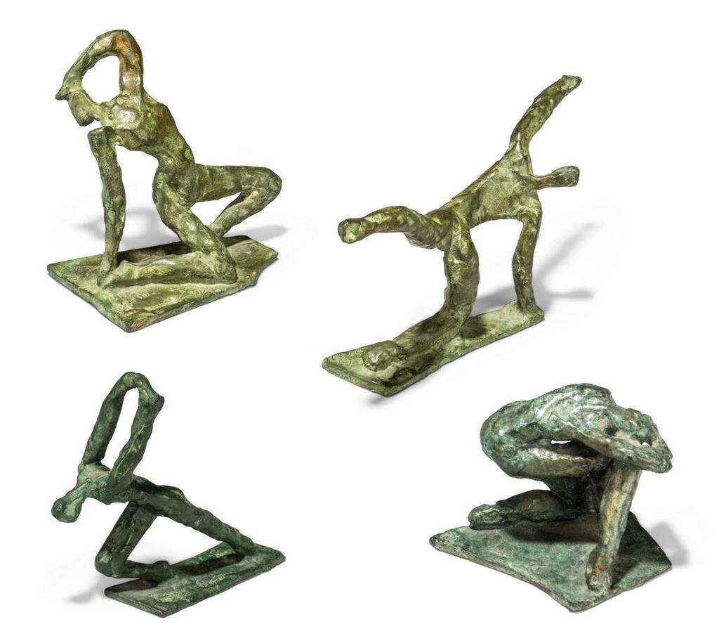 A group of four figures
