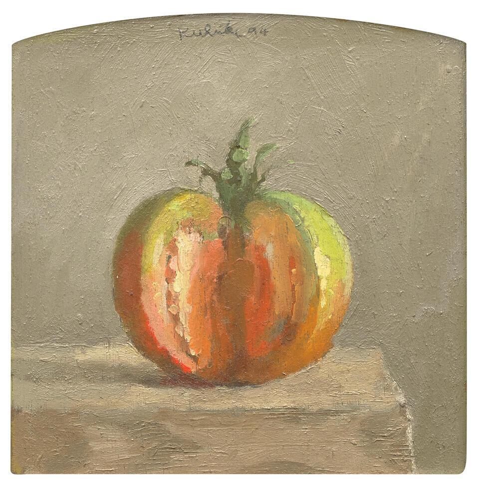 Half-Green Tomato with Slice Removed on Grey Background