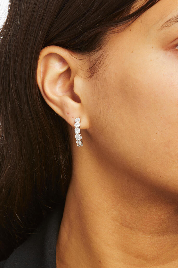 TIFFANY & CO.: A PAIR OF PLATINUM AND DIAMOND HOOP EARRINGS