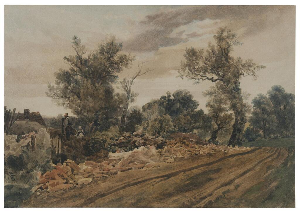 A wooded country track with figures and building materials