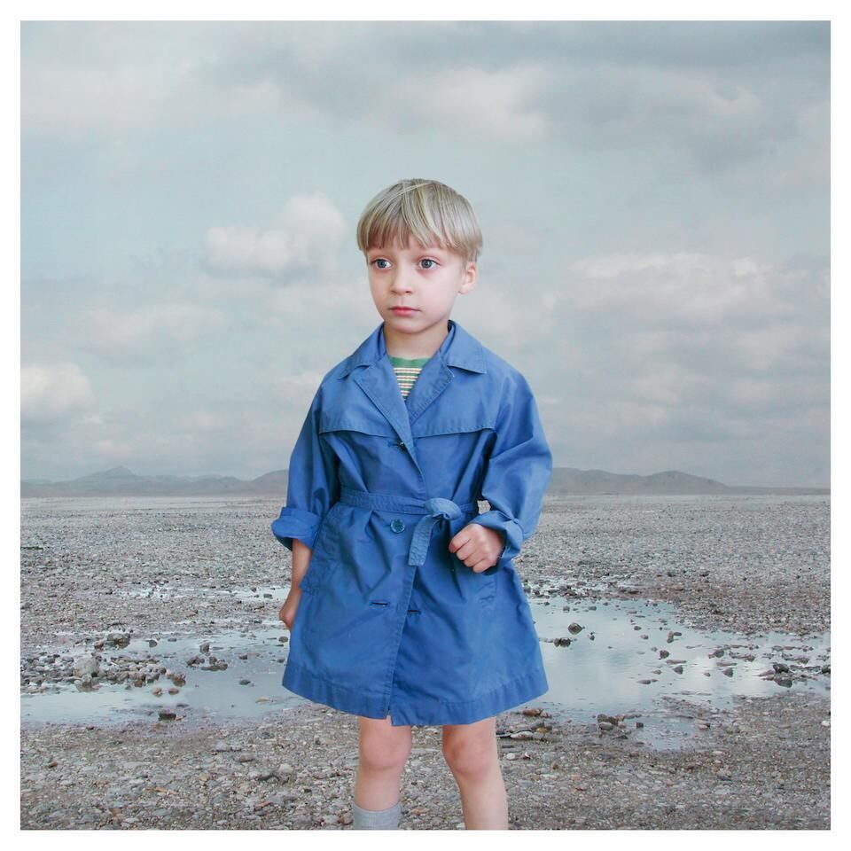 Boy in a Blue Raincoat 2