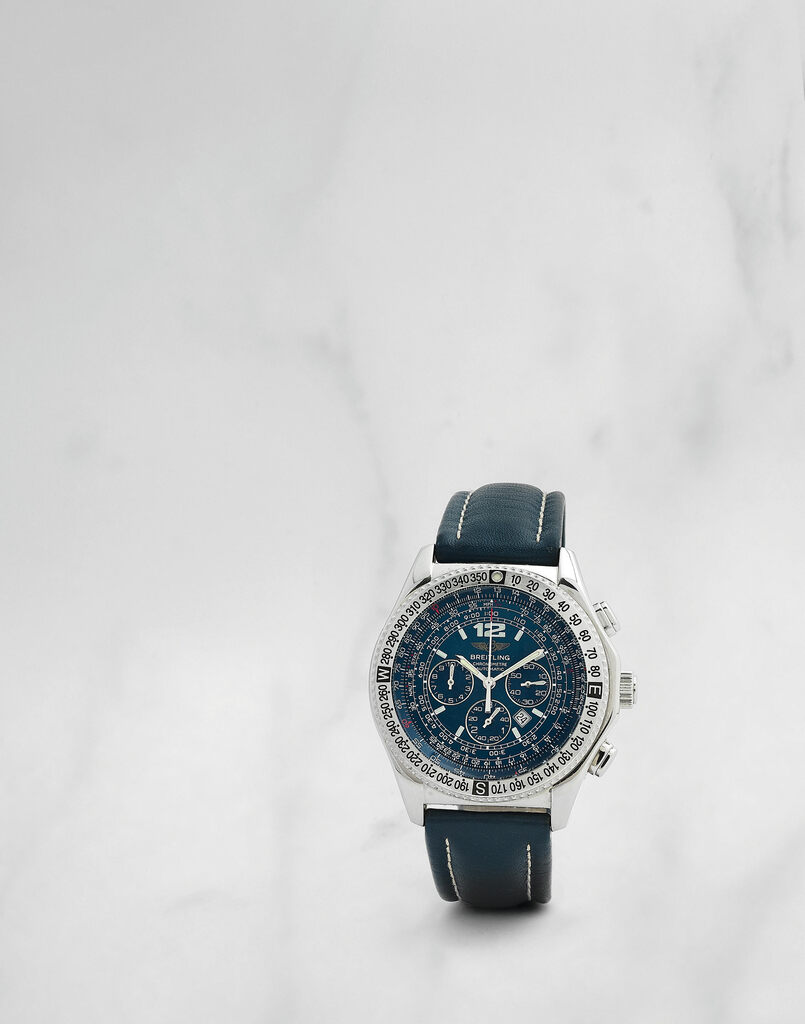 Breitling. Chronographe bracelet en acier avec date mouvement automatique