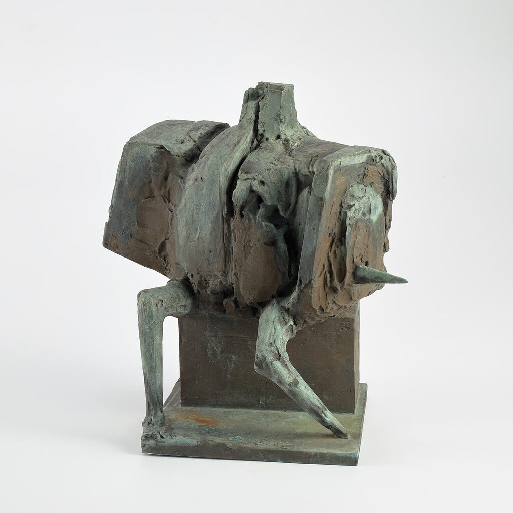 Seated Armed Figure