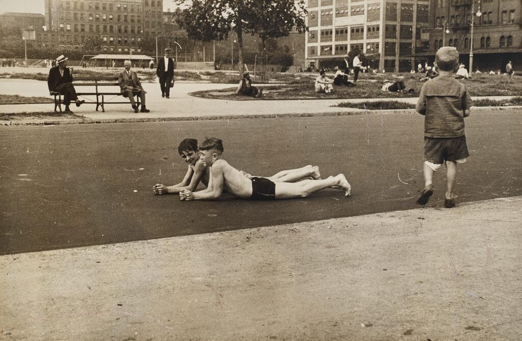 Boys Lying in Street